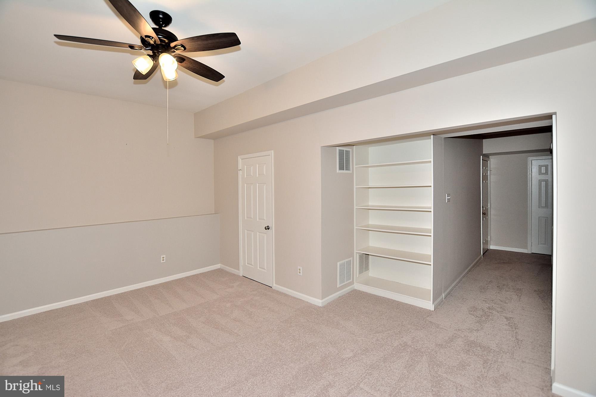 46878 Rabbitrun Terrace Sterling, VA 20164 - Photo 26 of 31 Lower level with built-in shelves