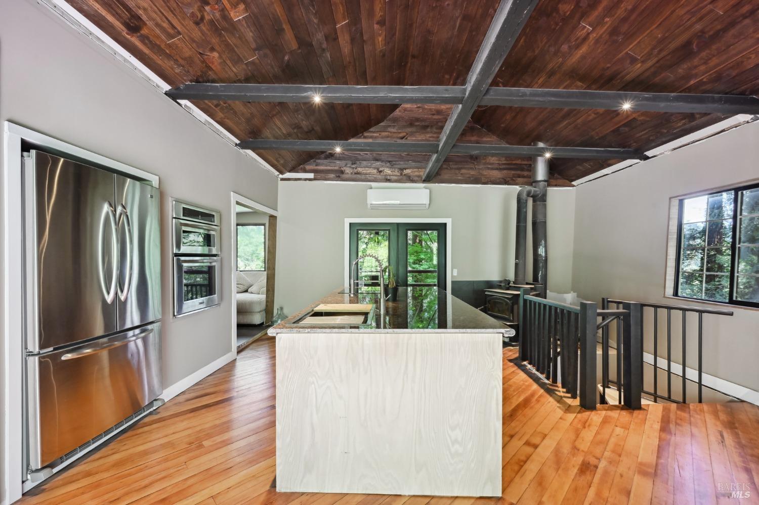 21713 Starrett Hill Drive Monte Rio, CA 95462 - Photo 4 of 50 a view of a dining room with furniture window and wooden floor