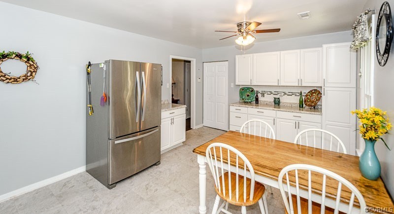 6701 Huntsville Road Chesterfield, VA 23832 - Photo 18 of 29 a kitchen with stainless steel appliances granite countertop a refrigerator and a sink