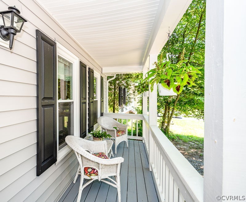6701 Huntsville Road Chesterfield, VA 23832 - Photo 3 of 29 a balcony with table and chairs