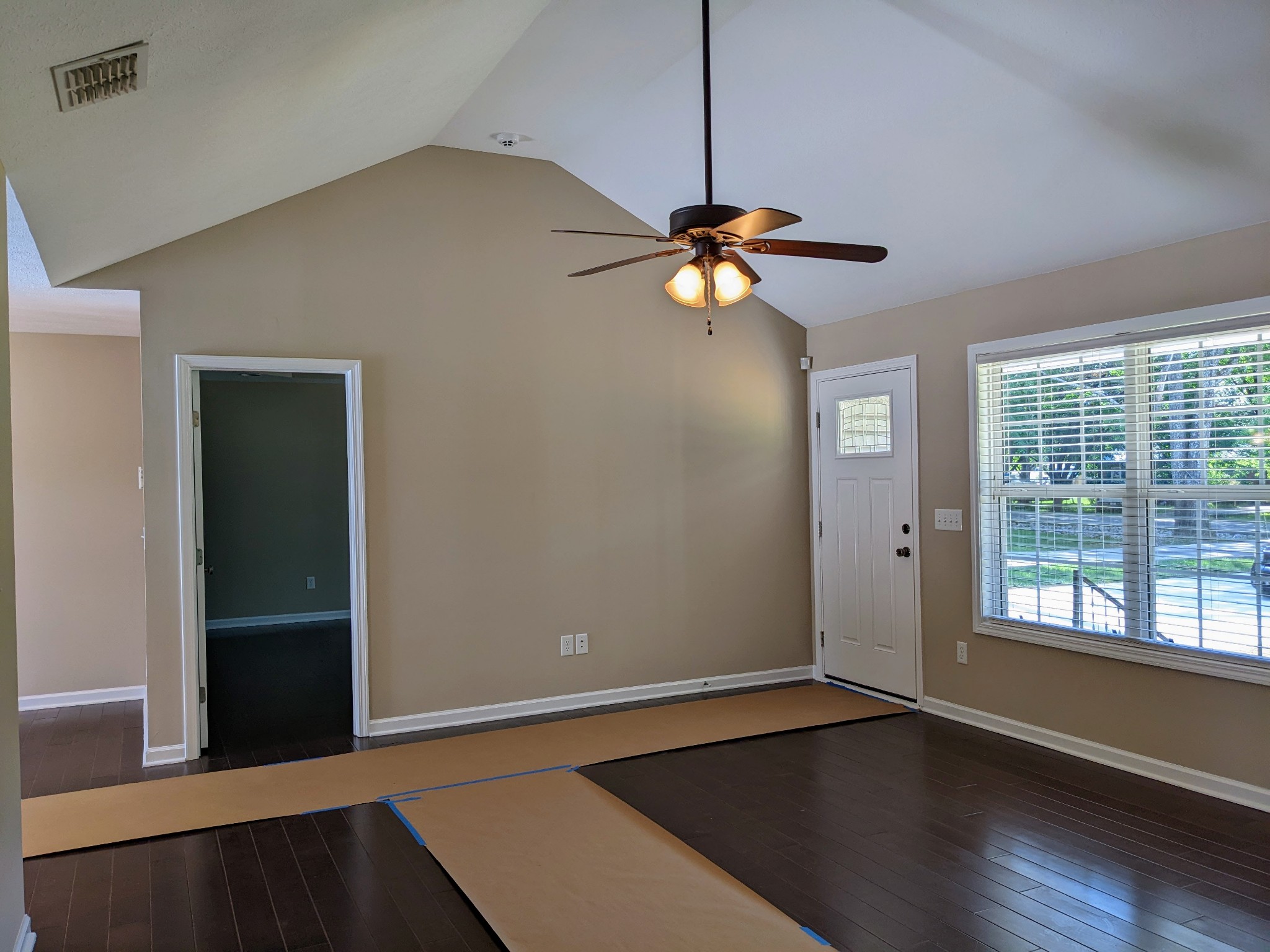 721 Marbury Road Tullahoma, TN 37388 - Photo 9 of 23 a view of an empty room with window and wooden floor