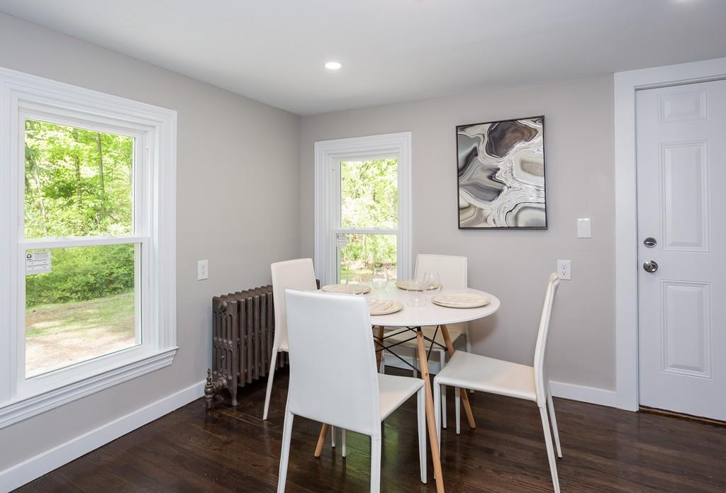 34 Plumtree Road Springfield, MA 01118 - Photo 4 of 22 a view of a dining room with furniture window and wooden floor