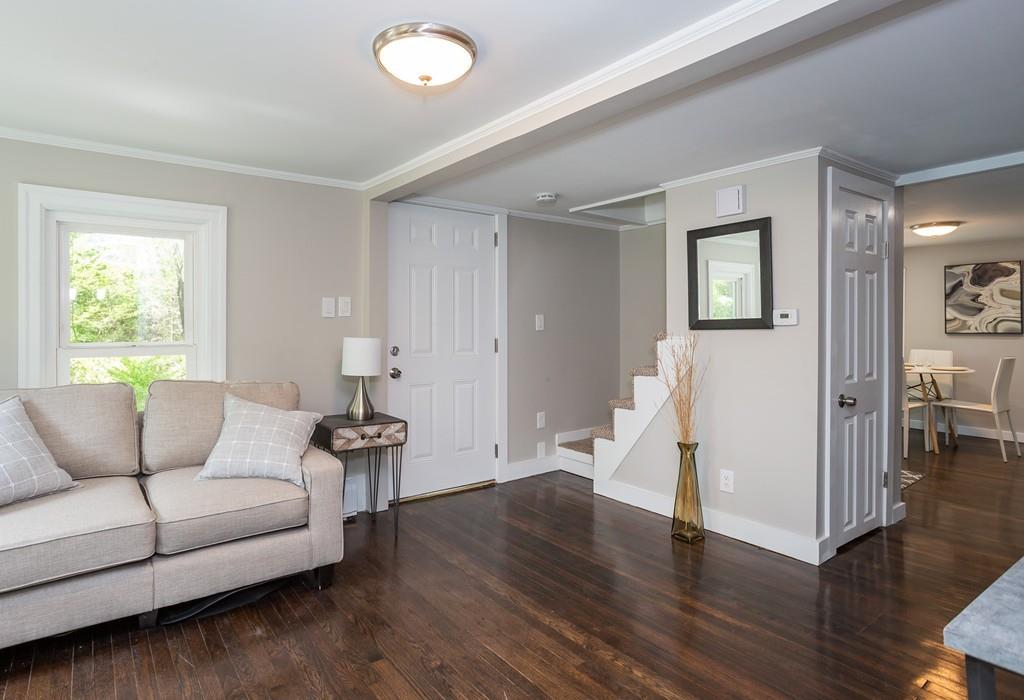 34 Plumtree Road Springfield, MA 01118 - Photo 7 of 22 a living room with furniture and wooden floor