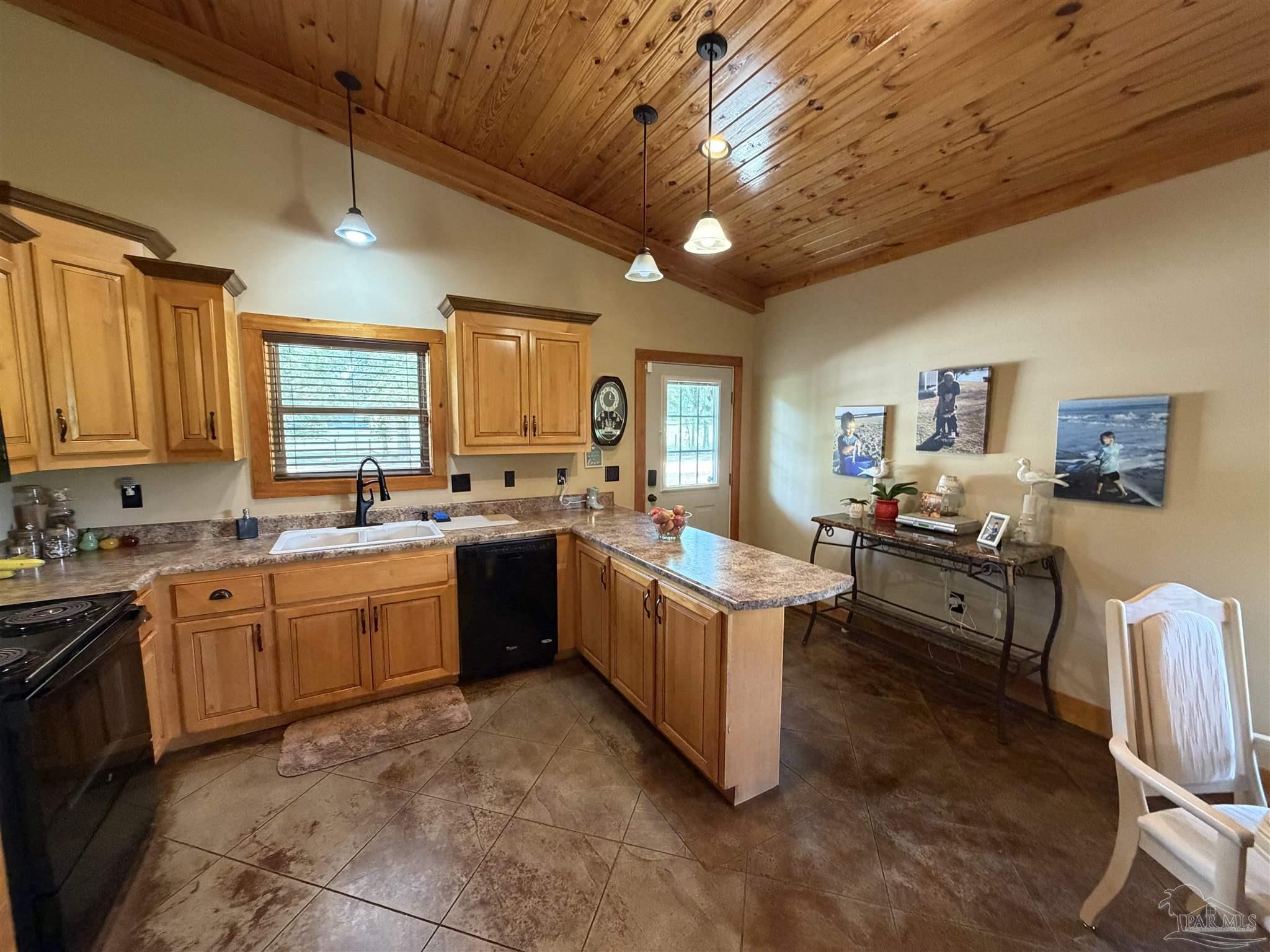 145 Tower Road Uriah, AL 36480 - Photo 3 of 72 a large kitchen with kitchen island granite countertop lots of counter top space