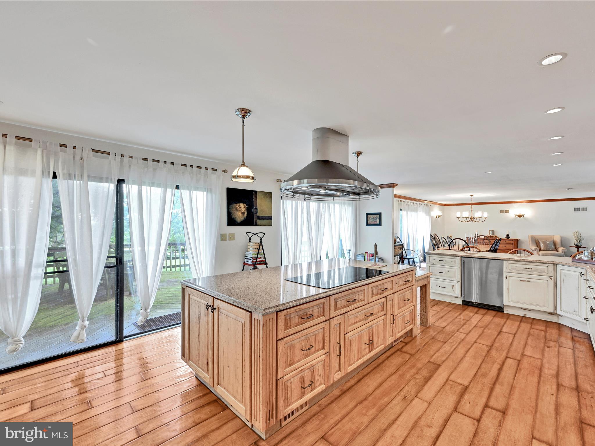 375 Mt Zion Road Dillsburg, PA 17019 - Photo 11 of 57 a kitchen with stainless steel appliances a sink and wooden cabinets