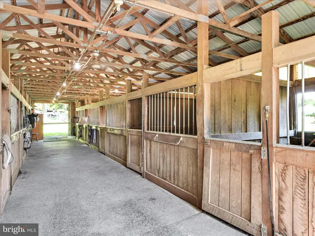 a view of a room with wooden racks
