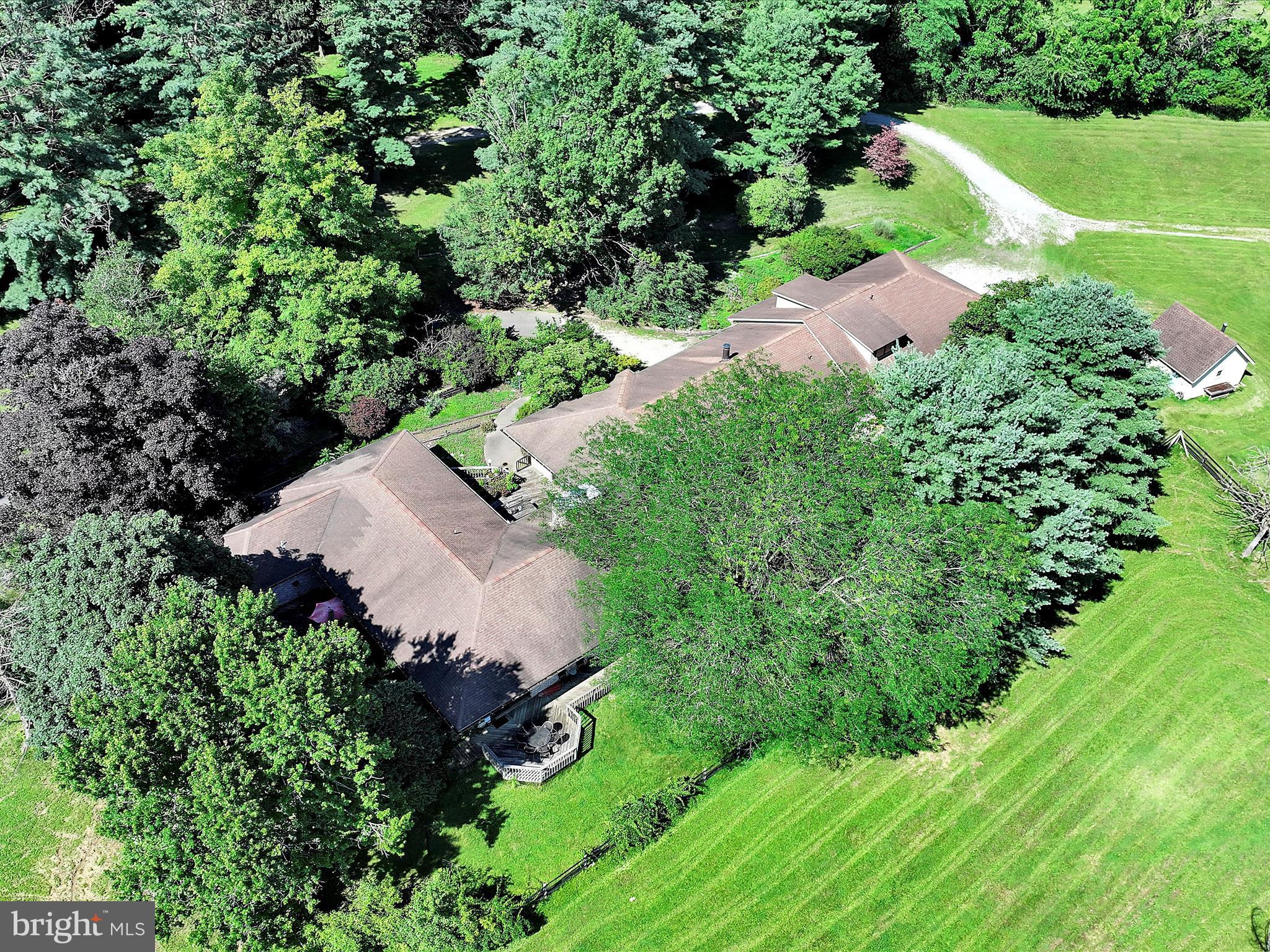 375 Mt Zion Road Dillsburg, PA 17019 - Photo 18 of 57 an aerial view of a house with a yard and lake view