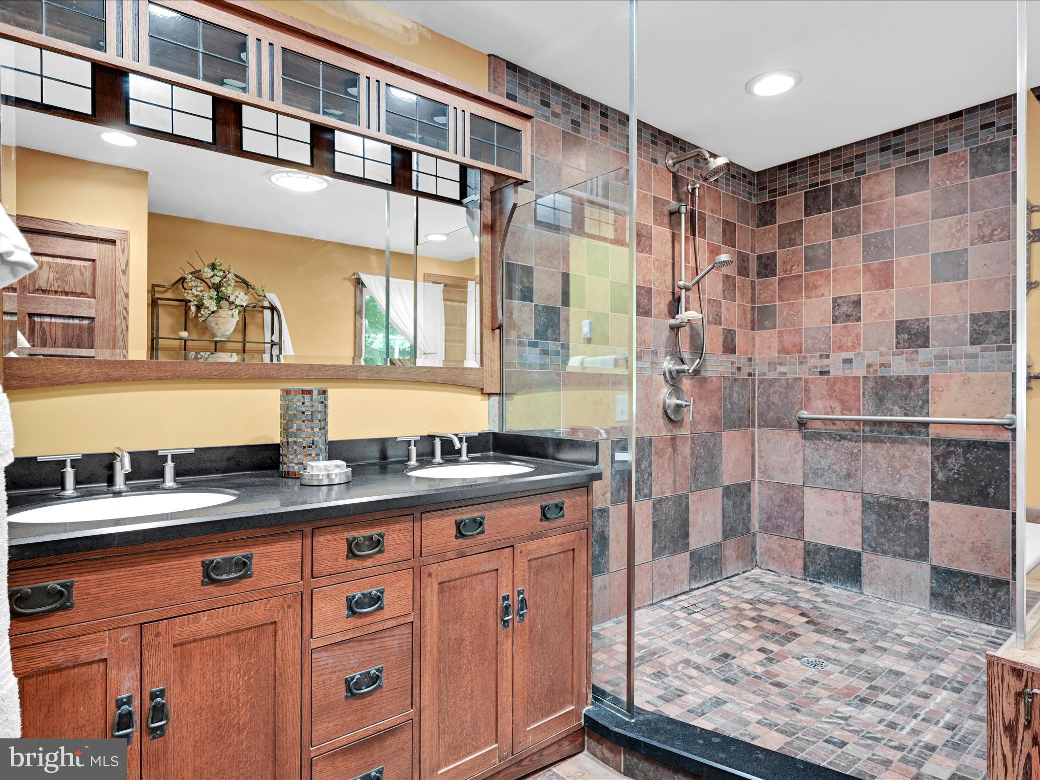 375 Mt Zion Road Dillsburg, PA 17019 - Photo 35 of 57 a bathroom with a granite countertop sink a mirror and shower