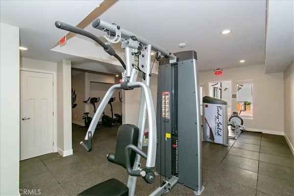 a view of a room with gym equipment