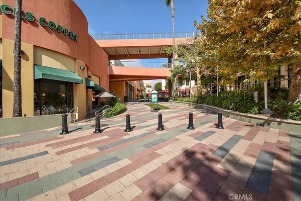 a view of a building with sitting area