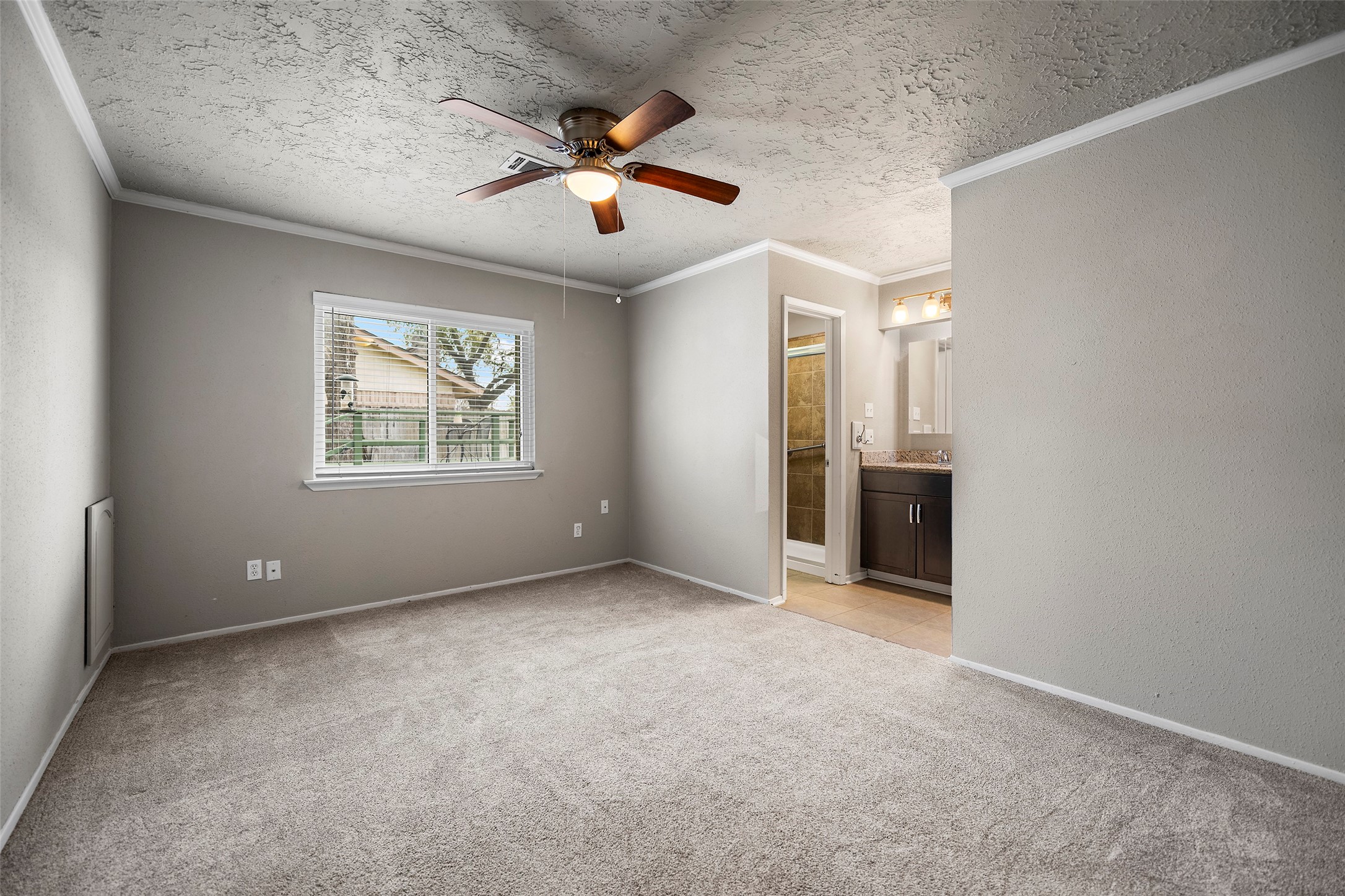 3419 Acorn Springs Lane Spring, TX 77389 - Photo 13 of 24 an empty room with chandelier fan and windows