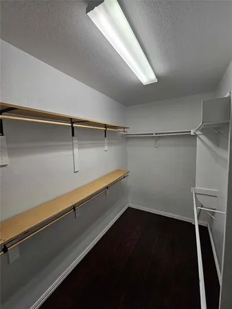 a view of a room with racks on the wall