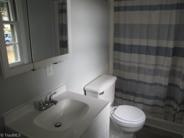4596 Shady Grove Road Providence, NC 27315 - Photo 16 of 23 Master Bath - new paint, flooring and fixtures.