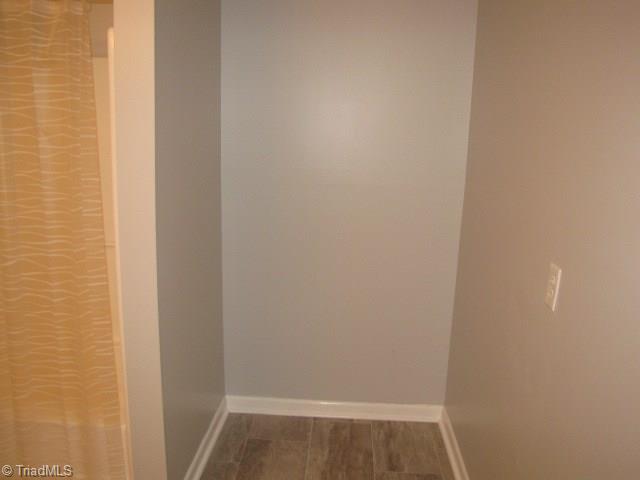 4596 Shady Grove Road Providence, NC 27315 - Photo 19 of 23 Hall Bath - large area would make a great space for a stackable washer/dryer or a linen closet.