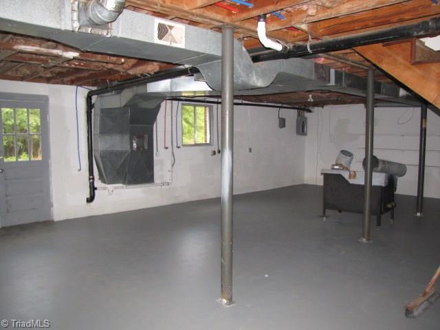 4596 Shady Grove Road Providence, NC 27315 - Photo 21 of 23 Basement - Woodstove conveys "AS IS" with no warranties or guarantees.