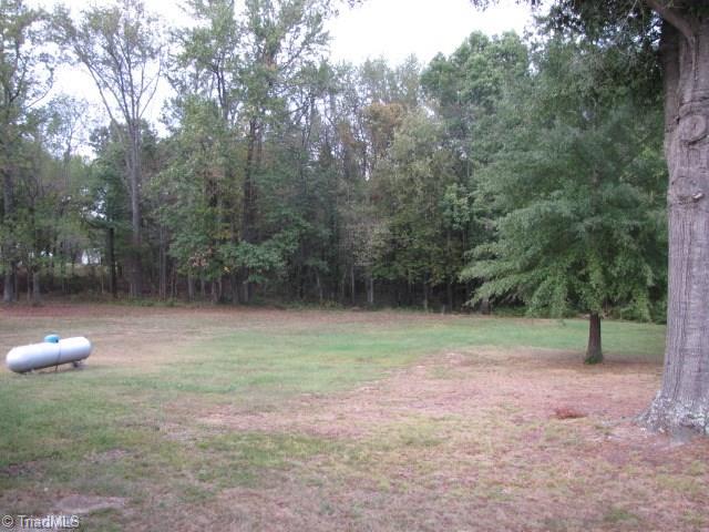 4596 Shady Grove Road Providence, NC 27315 - Photo 5 of 23 Backyard