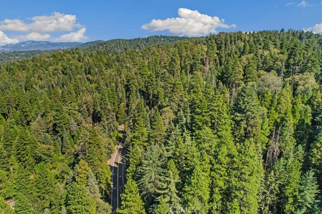 1 Ca-189 Twin Peaks, CA 92391 - Photo 11 of 13 a view of a large yard with lots of green space