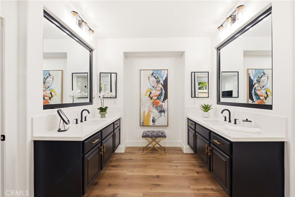 14431 Shawnee Street Moorpark, CA 93021 - Photo 23 of 72 a bathroom with a sink double vanity