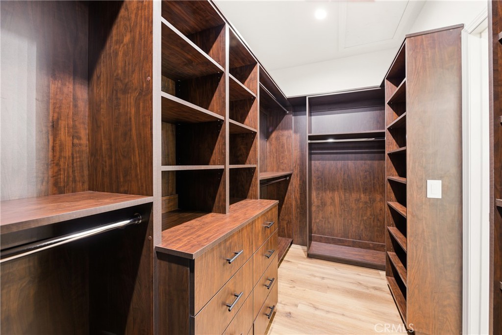 14431 Shawnee Street Moorpark, CA 93021 - Photo 27 of 72 a kitchen with stainless steel appliances a refrigerator and cabinets