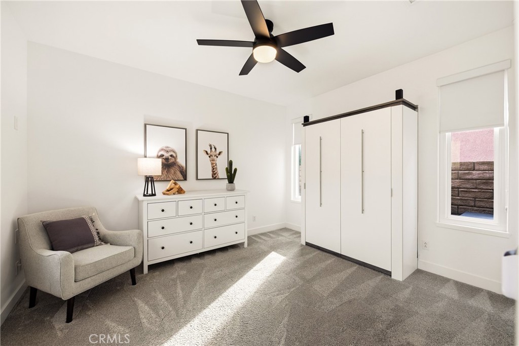 14431 Shawnee Street Moorpark, CA 93021 - Photo 30 of 72 a bedroom with a bed dresser and a window