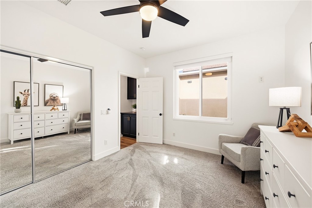 14431 Shawnee Street Moorpark, CA 93021 - Photo 31 of 72 a spacious bedroom with a bed and a window