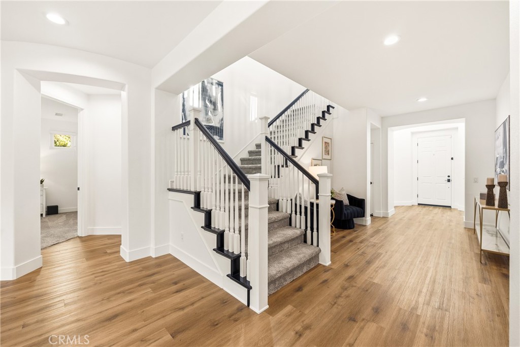 14431 Shawnee Street Moorpark, CA 93021 - Photo 34 of 72 a view of entryway with wooden floor and stairs