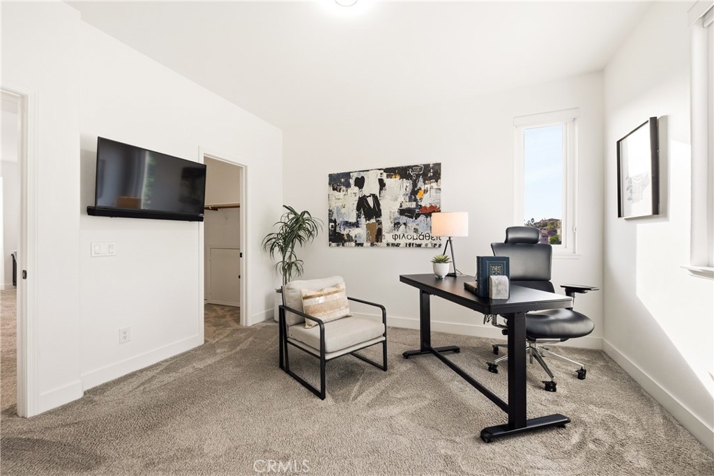 14431 Shawnee Street Moorpark, CA 93021 - Photo 38 of 72 a view of a livingroom with furniture and a flat screen tv