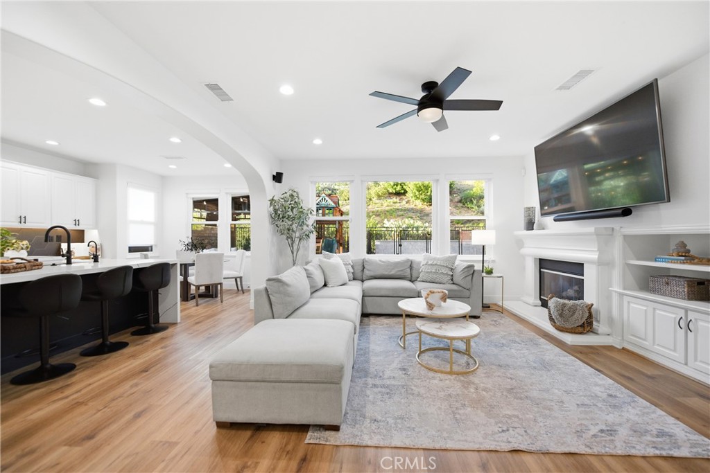 14431 Shawnee Street Moorpark, CA 93021 - Photo 8 of 72 a living room with furniture fireplace and flat screen tv