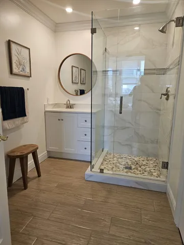 a view of swimming pool with a garden and plants