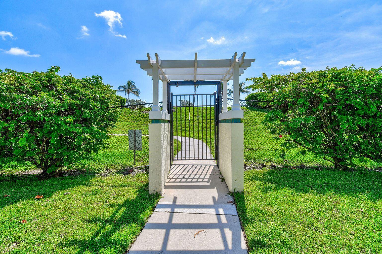 1906 Mainsail Circle Jupiter, FL 33477 - Photo 52 of 63 Access Beach Gate
