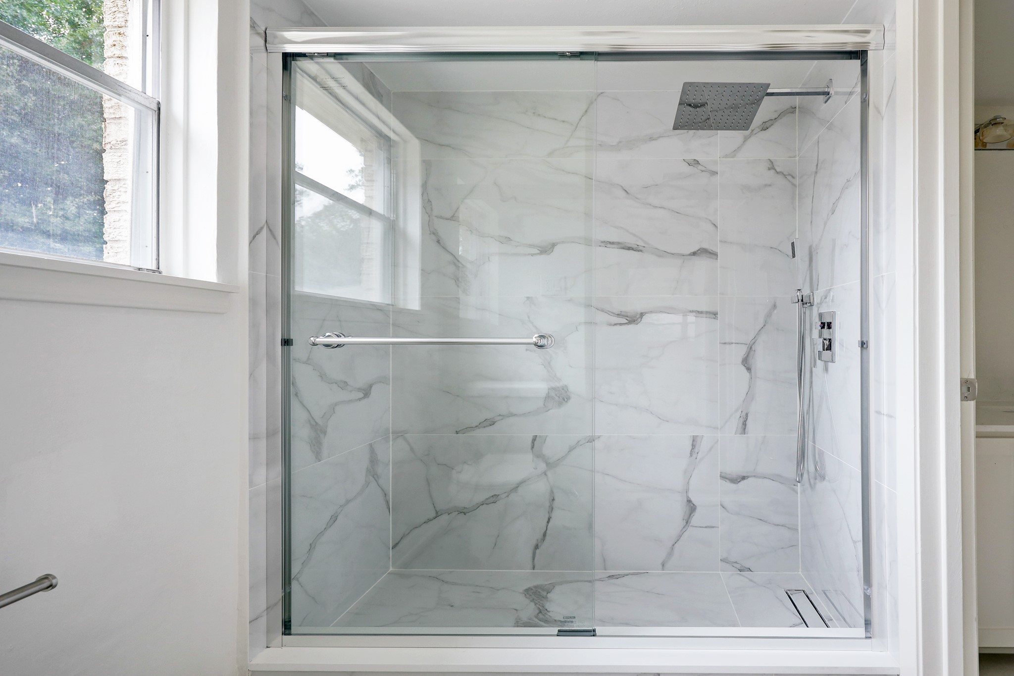 1810 Nocturne Lane Houston, TX 77043 - Photo 19 of 32 a bathroom with a shower