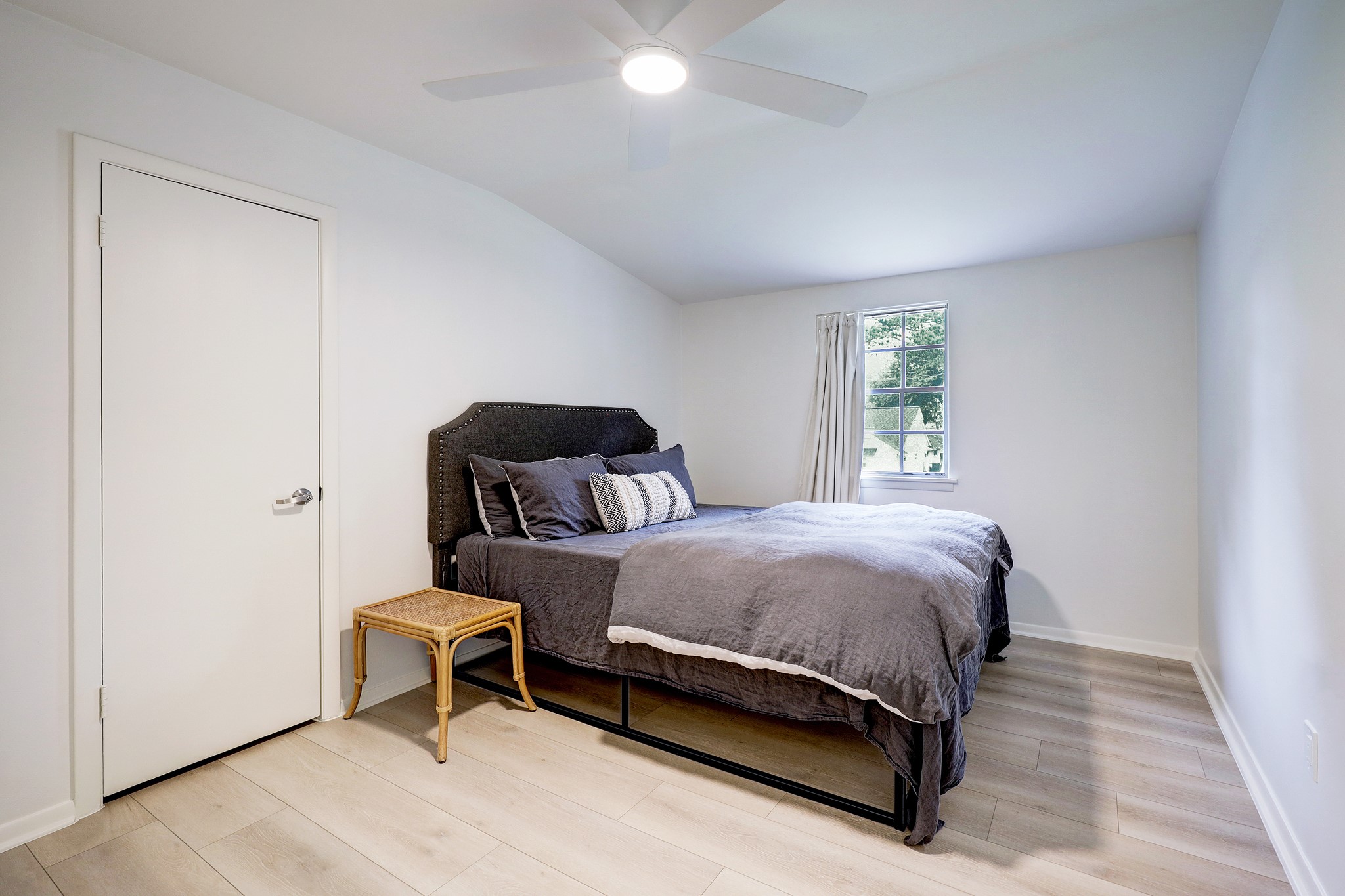 1810 Nocturne Lane Houston, TX 77043 - Photo 24 of 32 a bedroom with a bed and window