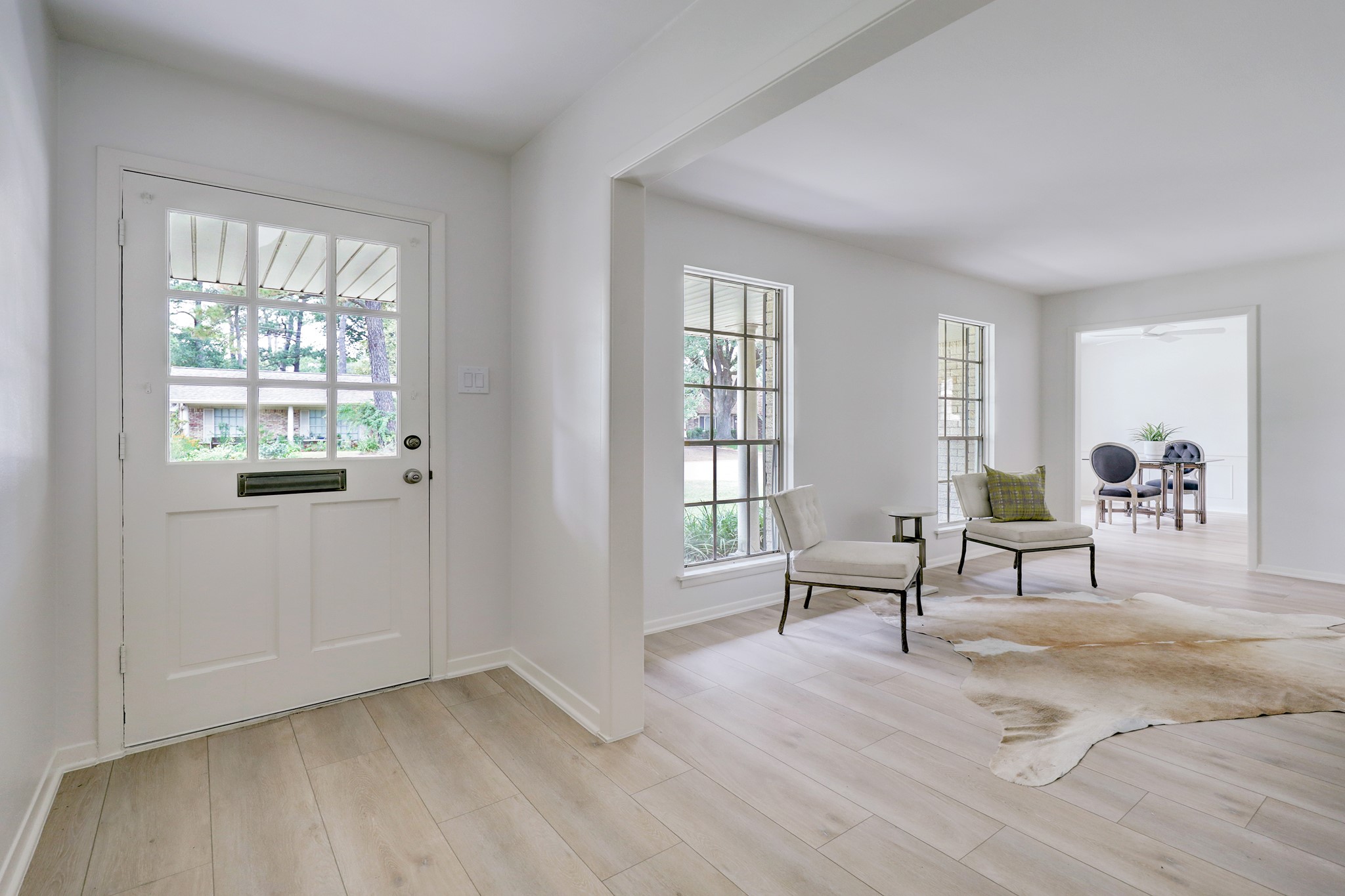 1810 Nocturne Lane Houston, TX 77043 - Photo 7 of 32 a living room with furniture and a window