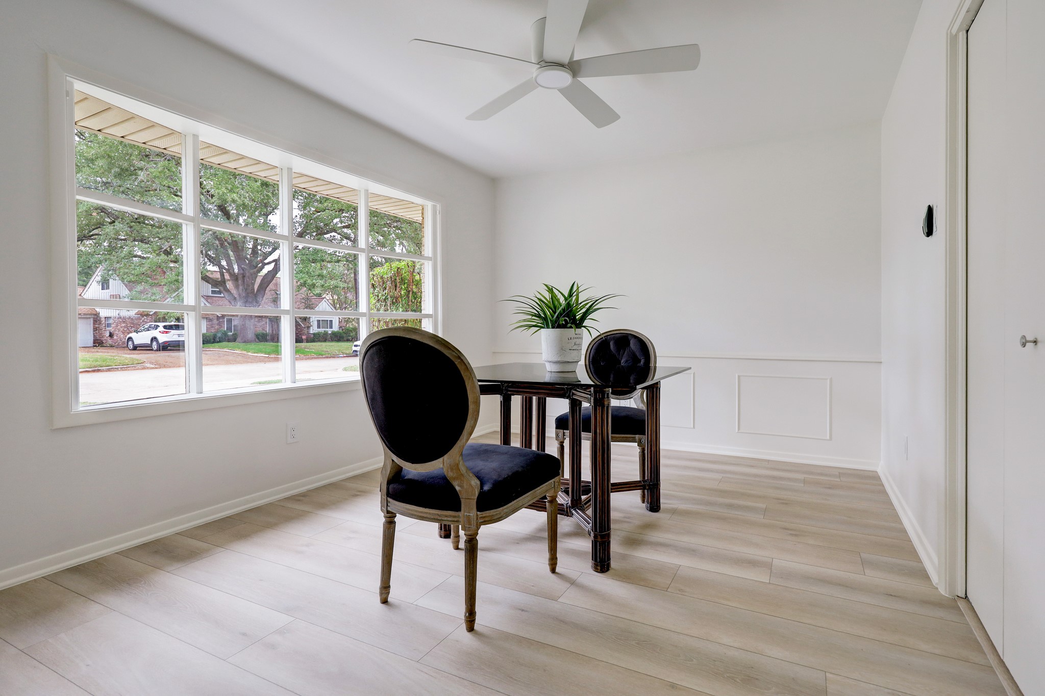 1810 Nocturne Lane Houston, TX 77043 - Photo 10 of 32 a workspace with wooden floor and a window