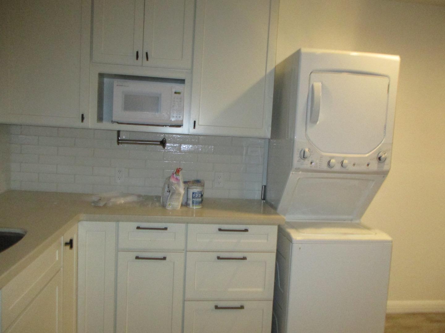 1160 3rd Street, Unit B Gilroy, CA 95020 - Photo 5 of 12 a bathroom with a sink a vanity and a mirror