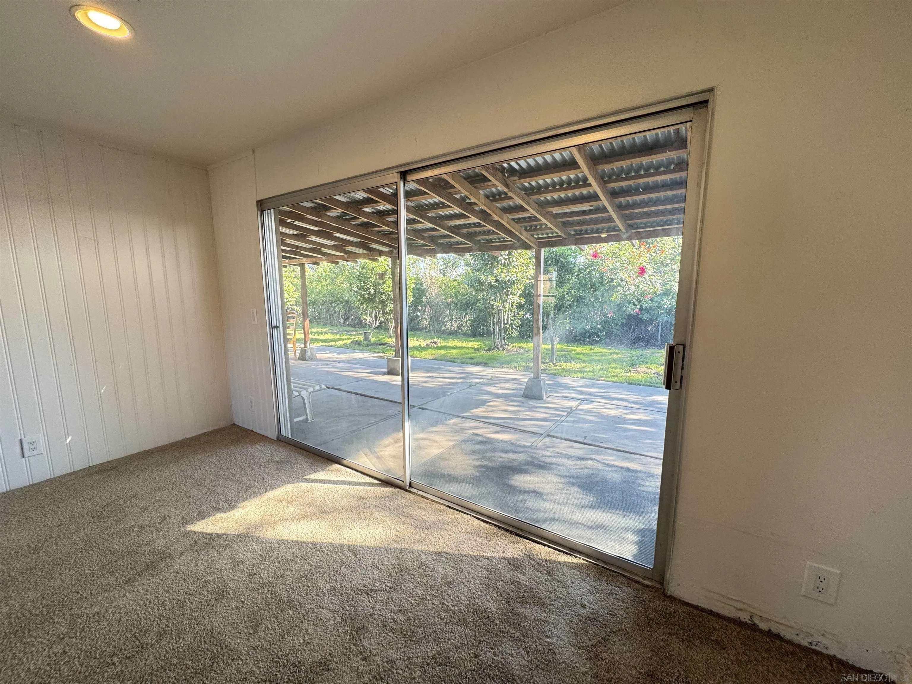 1531 View Pointe Avenue Escondido, CA 92027 - Photo 13 of 41 a view of an empty room with glass door