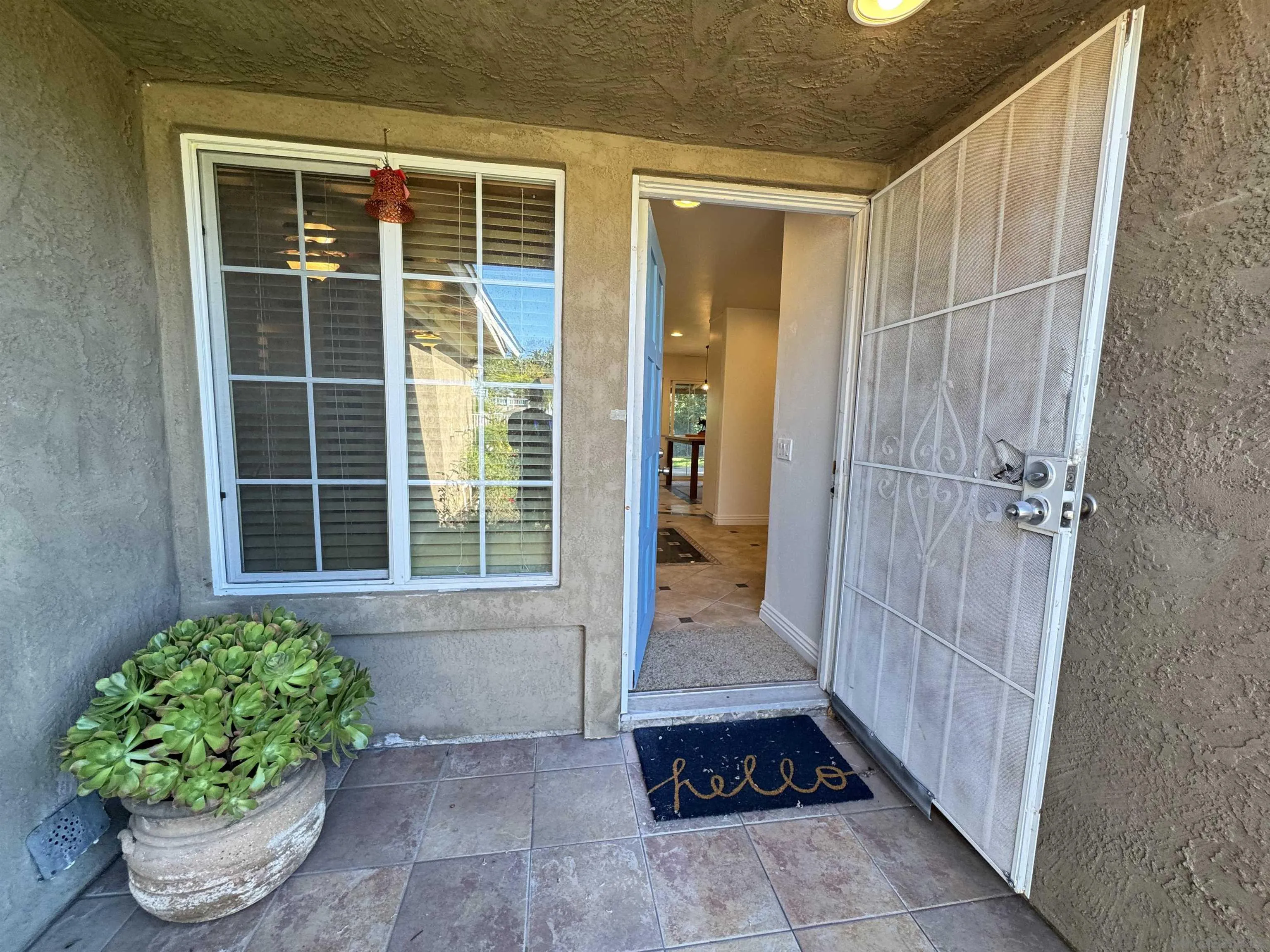 1531 View Pointe Avenue Escondido, CA 92027 - Photo 24 of 41 a view of a entryway door of the house
