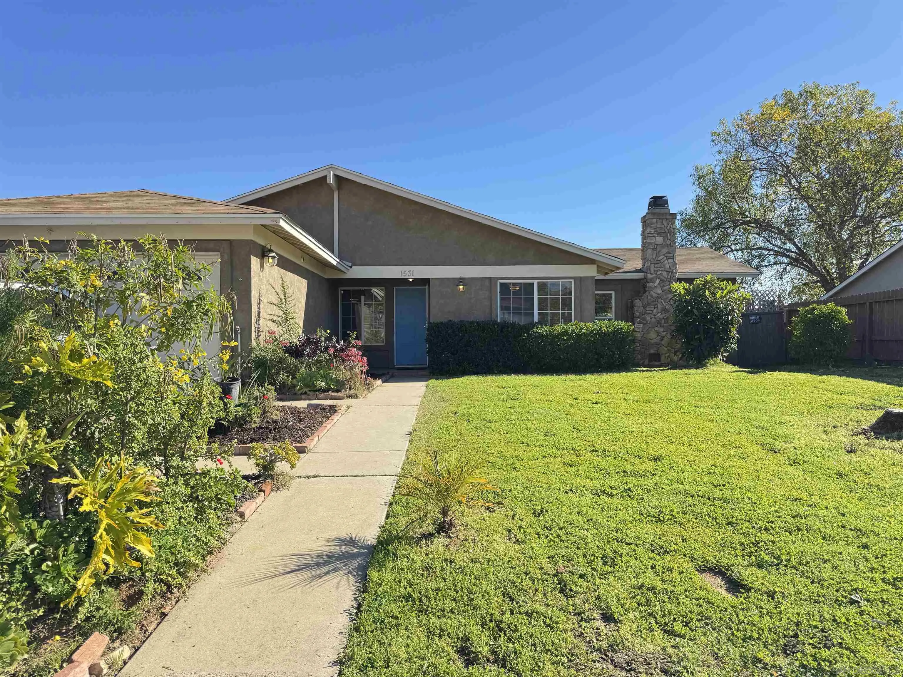 1531 View Pointe Avenue Escondido, CA 92027 - Photo 28 of 41 a front view of house with yard and trees around