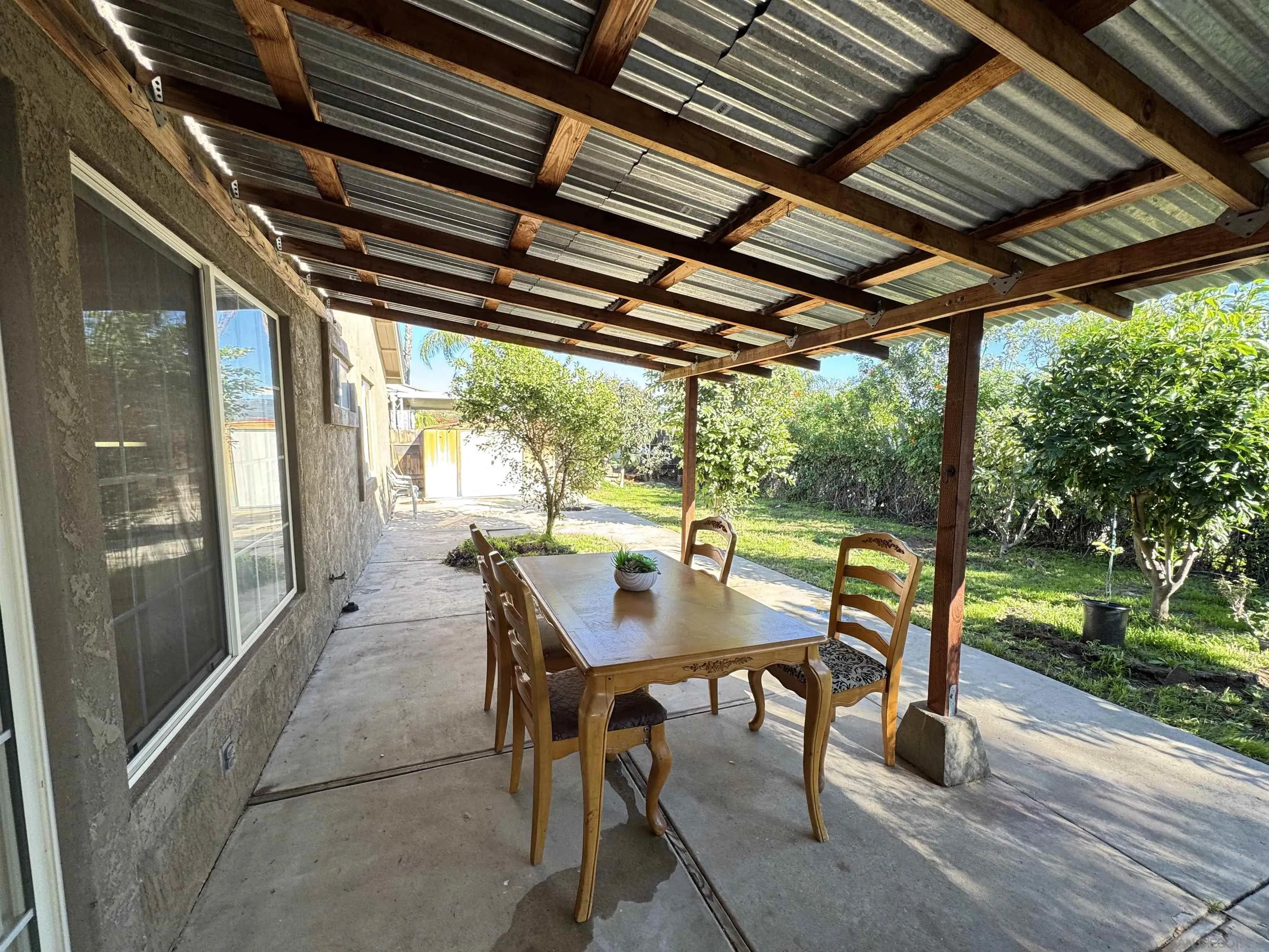 1531 View Pointe Avenue Escondido, CA 92027 - Photo 33 of 41 a view of a porch with furniture and a yard