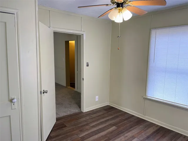 a kitchen with a sink appliances and cabinets
