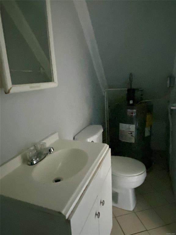 35 Main Street Walden, NY 12586 - Photo 8 of 10 Bathroom featuring tile patterned flooring, vanity, and toilet