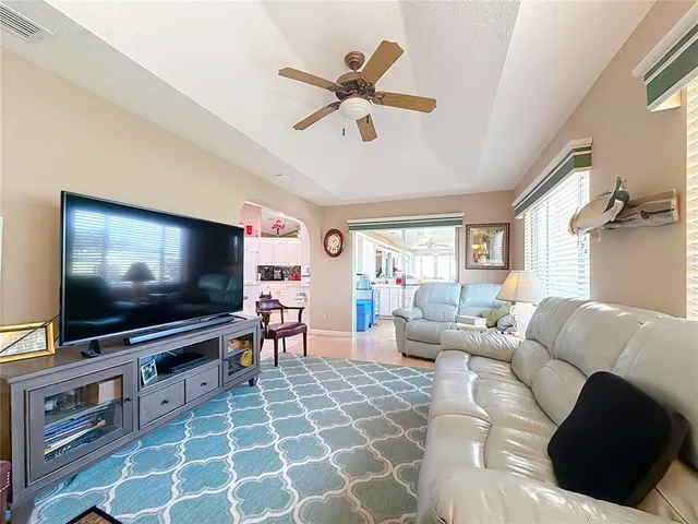 a spacious bathroom with a large tub and sink