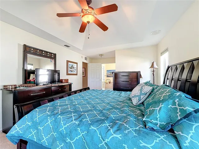 a dining room with furniture and windows