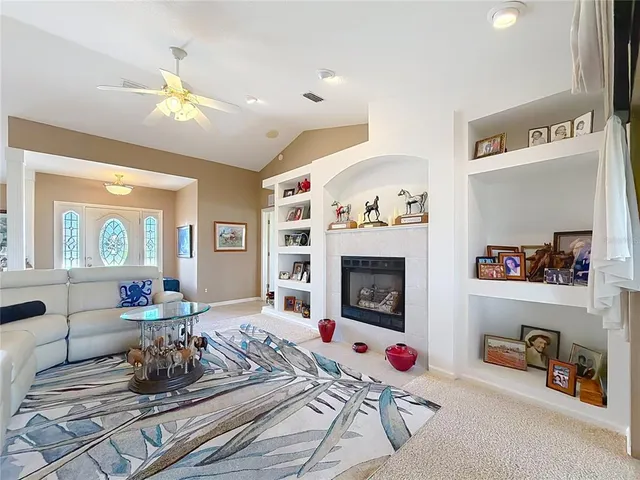 a kitchen that has a sink and a stove in it