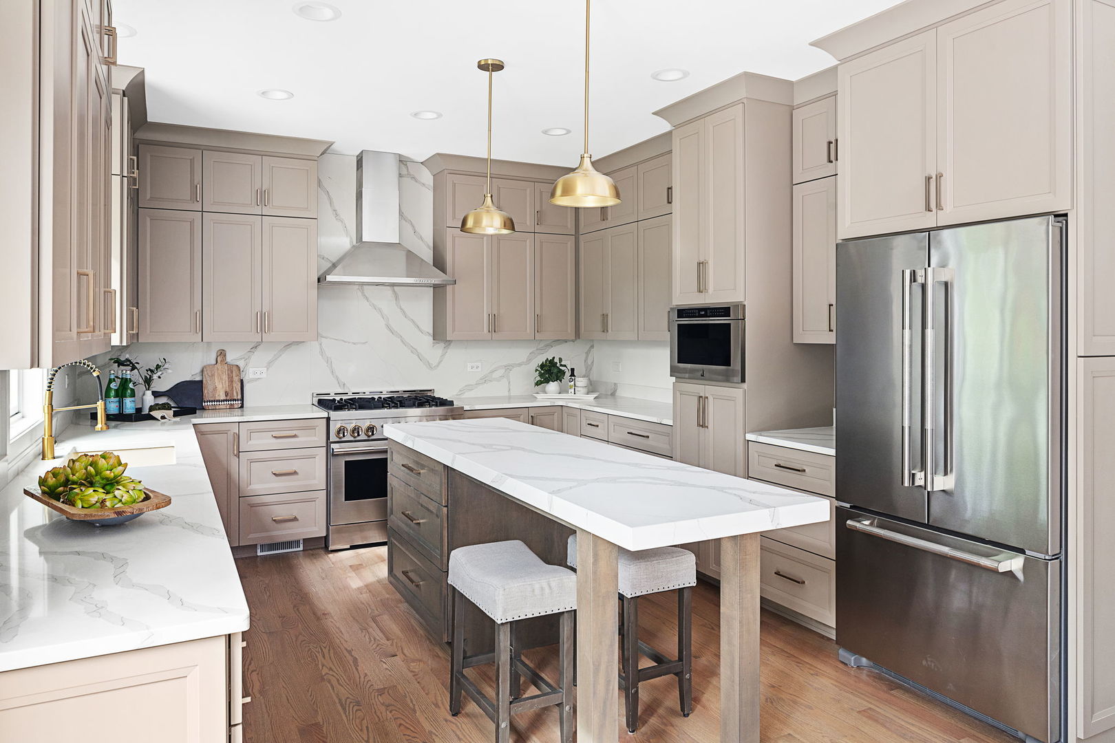 110 South Lorraine Road Wheaton, IL 60187 - Photo 14 of 40 a kitchen with white cabinets and stainless steel appliances