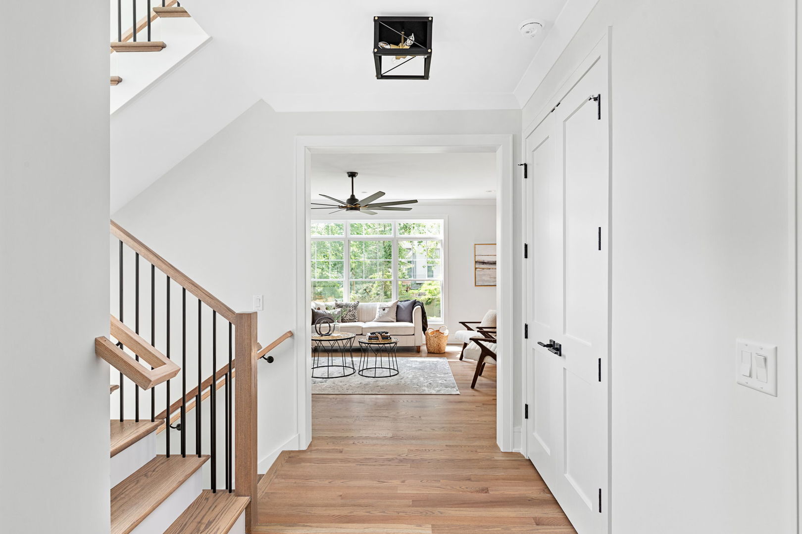 110 South Lorraine Road Wheaton, IL 60187 - Photo 17 of 40 a view of a hallway with wooden floor and windows