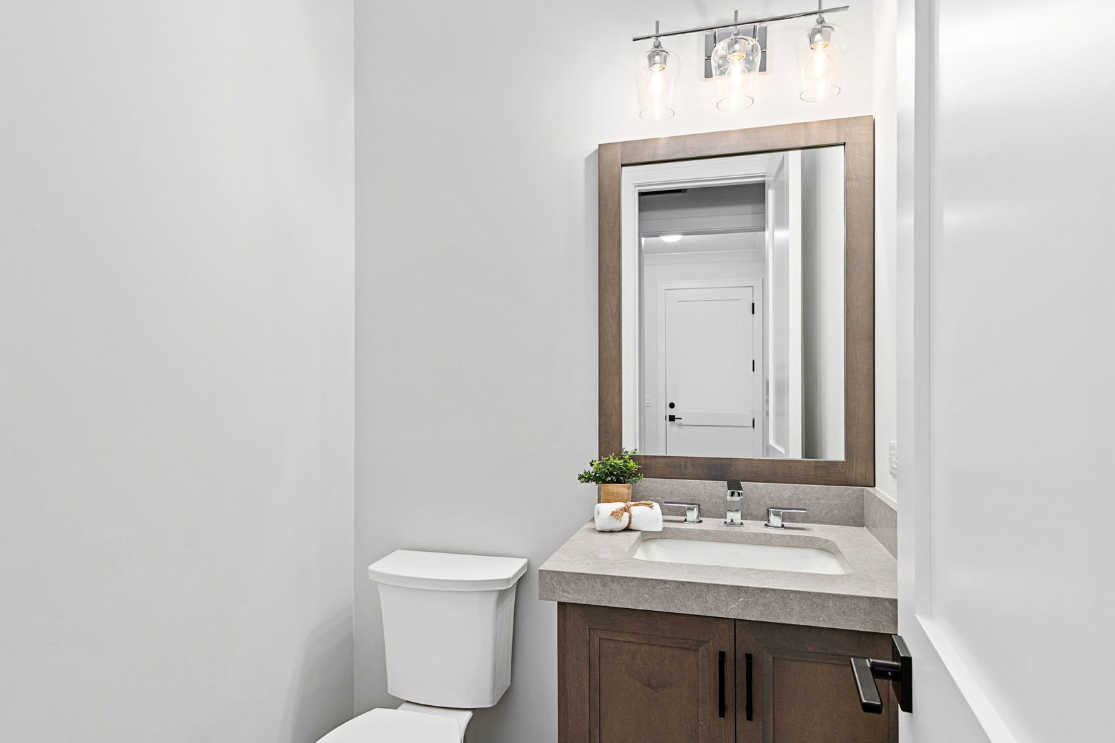 110 South Lorraine Road Wheaton, IL 60187 - Photo 19 of 40 a bathroom with a sink a toilet and mirror