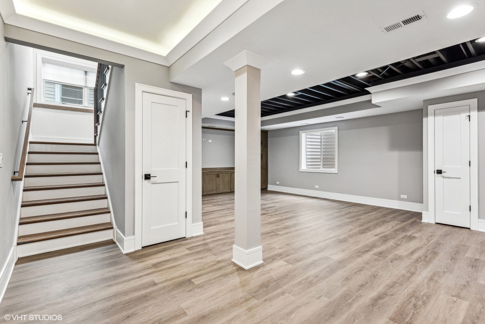 110 South Lorraine Road Wheaton, IL 60187 - Photo 31 of 40 an empty room with wooden floor and windows