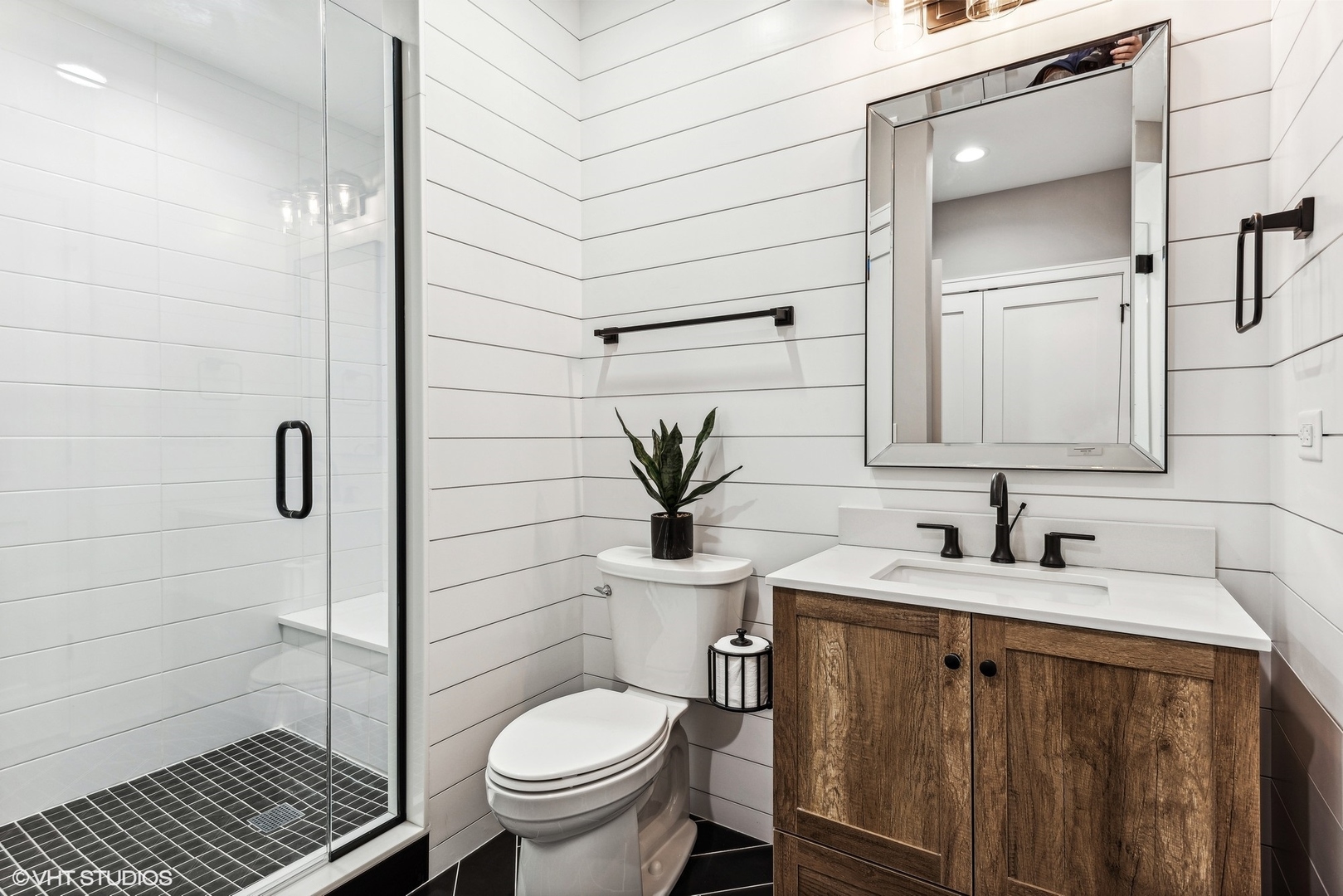 110 South Lorraine Road Wheaton, IL 60187 - Photo 34 of 40 a bathroom with a sink toilet and shower
