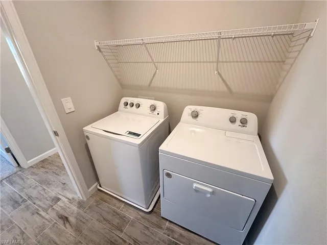 a bathroom with a sink a toilet a mirror and vanity